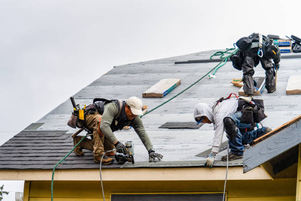 Professional Storm Damage Roof Repair technician working in Atlanta, IN